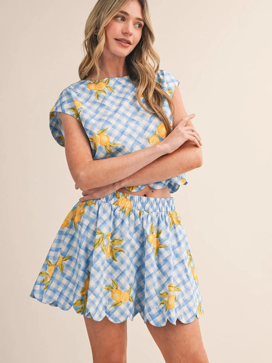 Two piece short sleeve and mini skirt set.