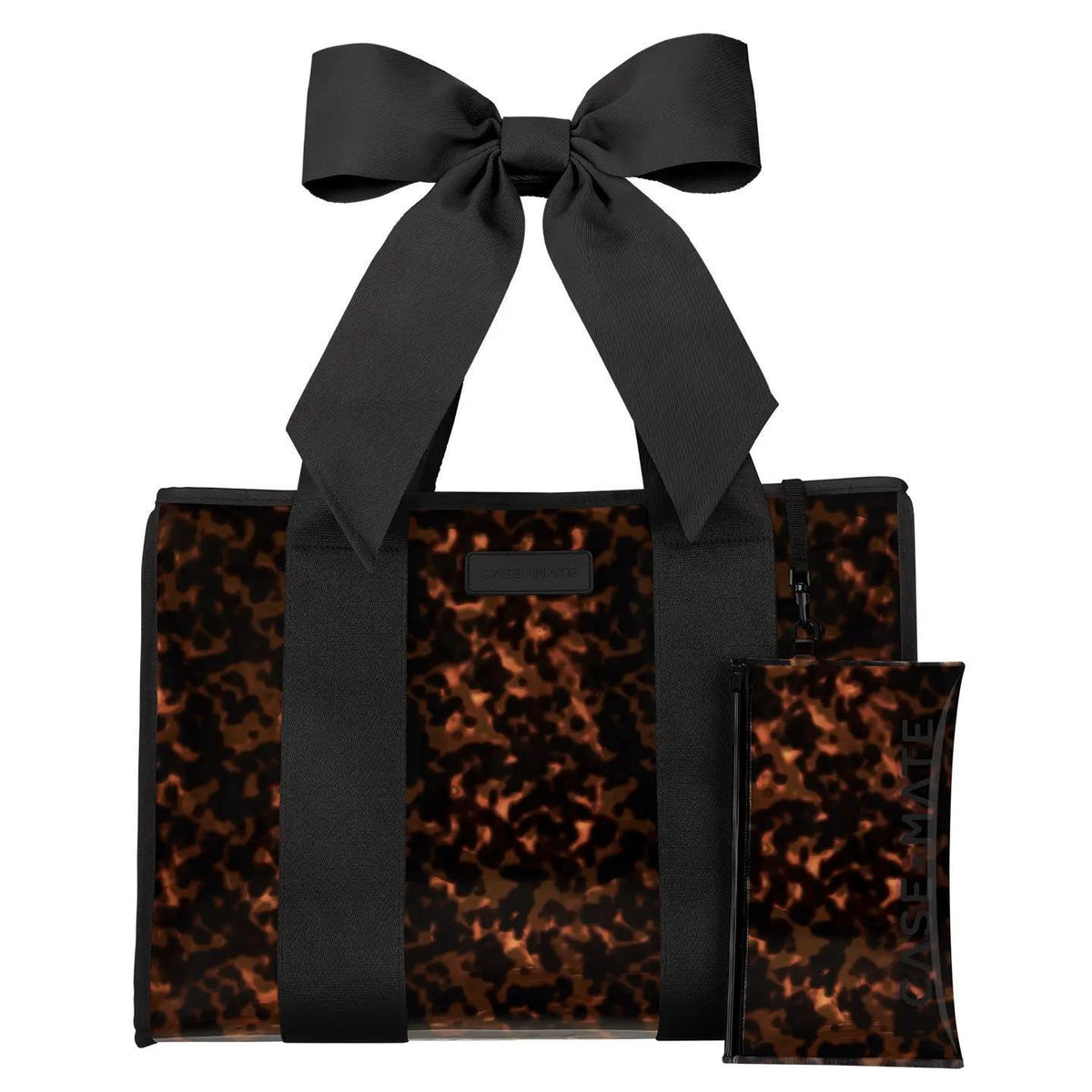 Brown and black bag with phone case attached and bow at the top. 