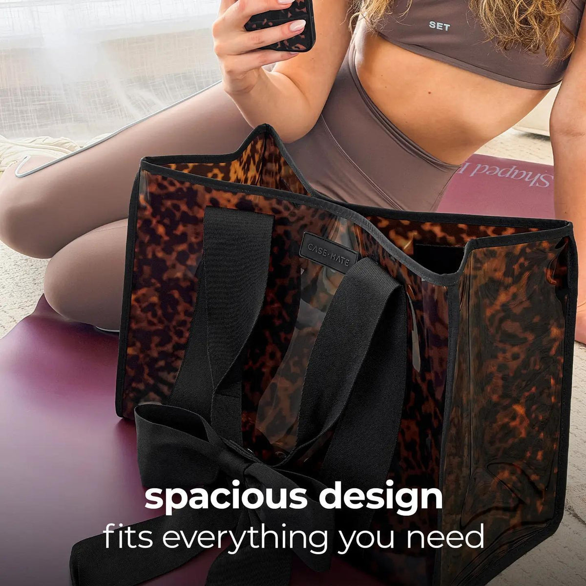 Picture on the bag with wording on image that states "Spacious design fits everything you need". 